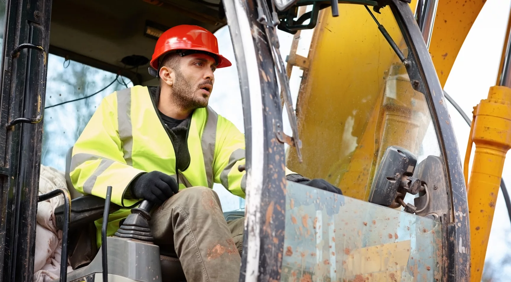 image of a man operating construction equipment